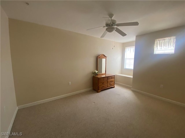 3054 Driftwood Way Unit 4508, Naples, FL 34109 - spare room featuring light colored carpet and ceiling fan