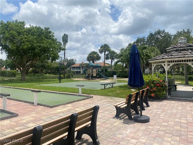 3054 Driftwood Way Unit 4508, Naples, FL 34109 - view of community featuring a bocce ball area, a gazebo, and a yard