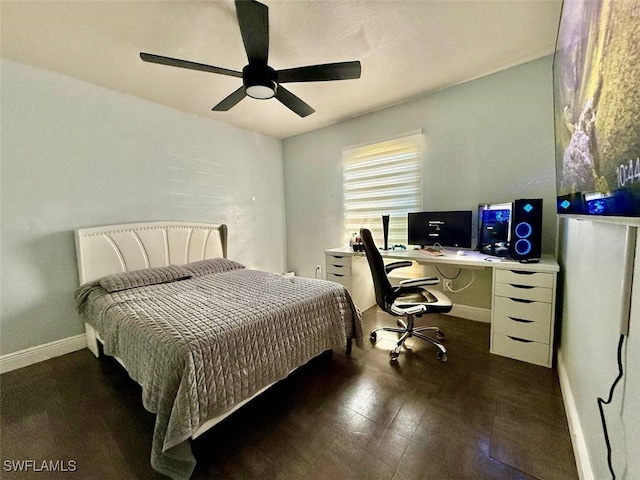 bedroom featuring ceiling fan and dark hardwood / wood-style flooring