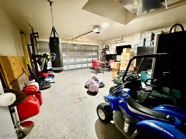 garage featuring a garage door opener