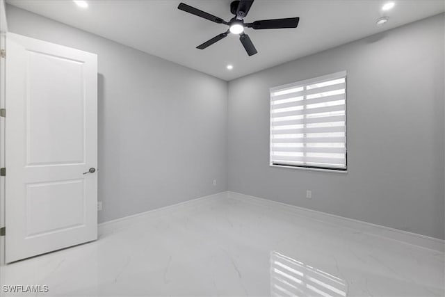 empty room featuring ceiling fan