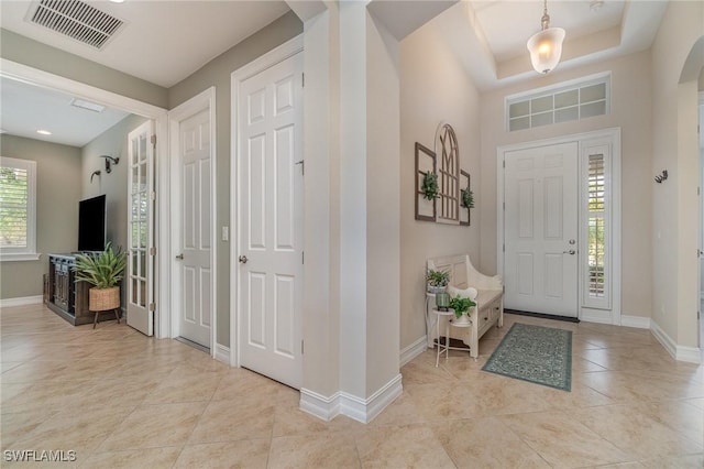 3200 Magnolia Landing Ln, North Fort Myers, FL 33917 - foyer entrance with light tile patterned flooring and arched walkways