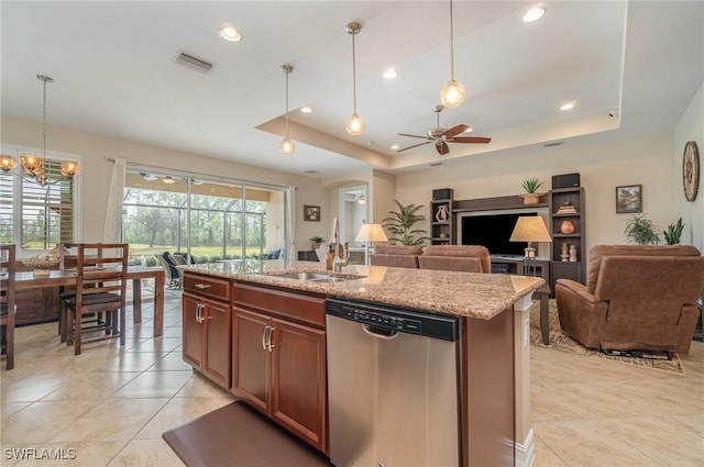 3200 Magnolia Landing Ln, North Fort Myers, FL 33917 - kitchen featuring stainless steel dishwasher, open floor plan, a ceiling fan, light stone countertops, and pendant lighting
