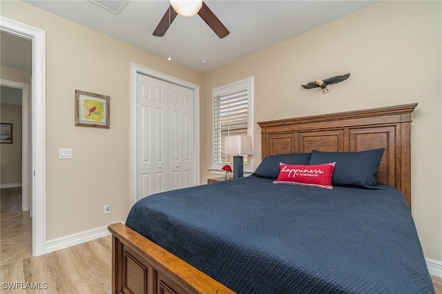 3200 Magnolia Landing Ln, North Fort Myers, FL 33917 - bedroom featuring light wood-type flooring, a closet, and a ceiling fan