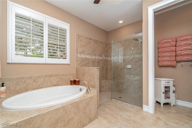 bathroom featuring ceiling fan, tile patterned floors, and plus walk in shower