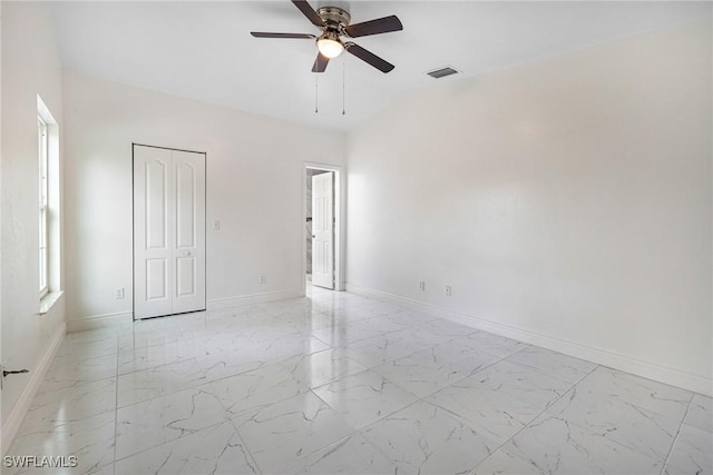 spare room featuring ceiling fan