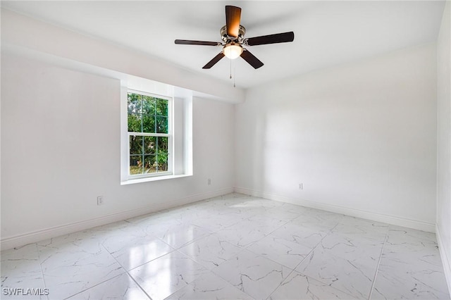 spare room featuring ceiling fan