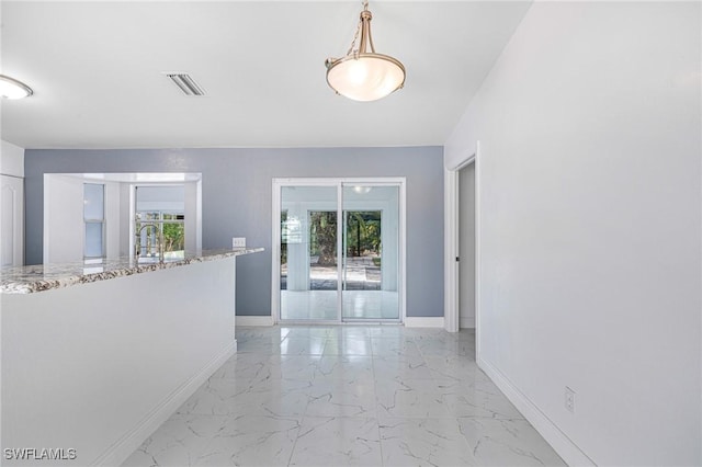 hallway featuring sink