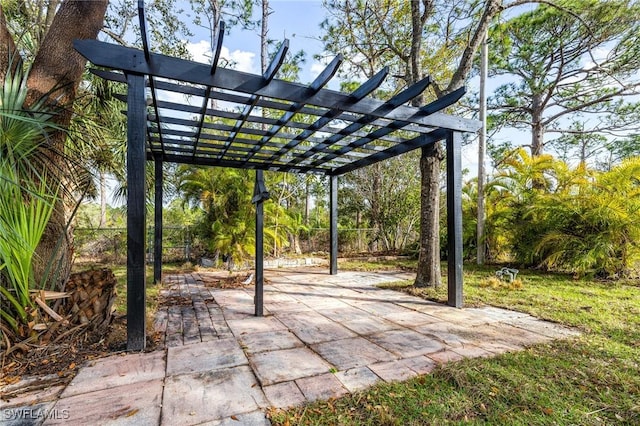 exterior space featuring a pergola and a patio