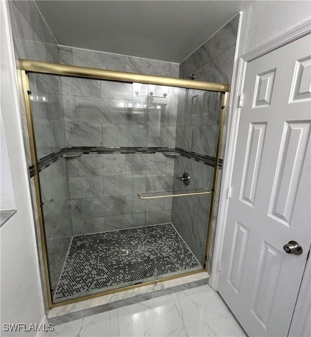 bathroom with an enclosed shower