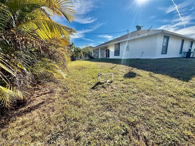 exterior space with a lawn