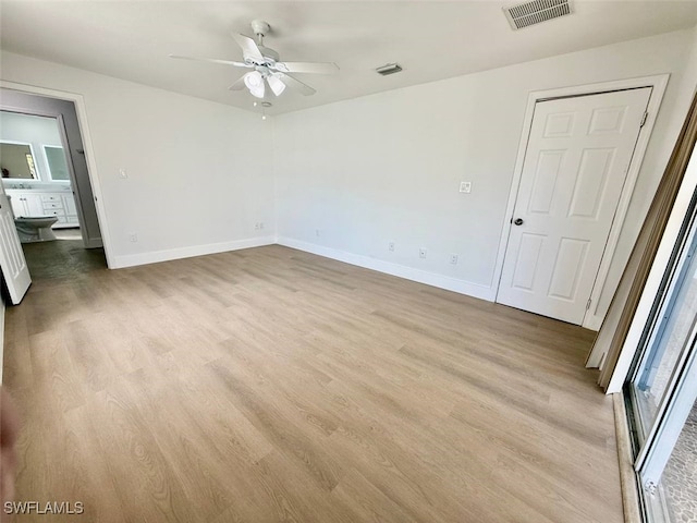 unfurnished bedroom featuring light wood-type flooring and ceiling fan