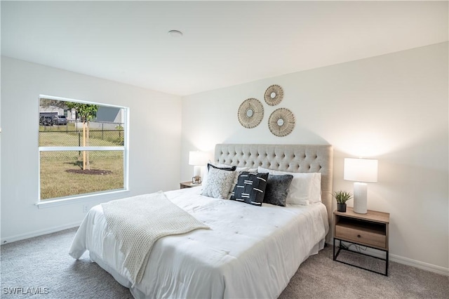 bedroom with light carpet