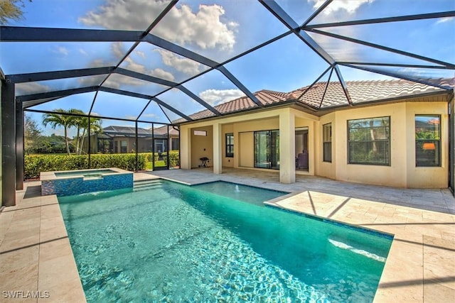 view of swimming pool featuring glass enclosure, an in ground hot tub, and a patio