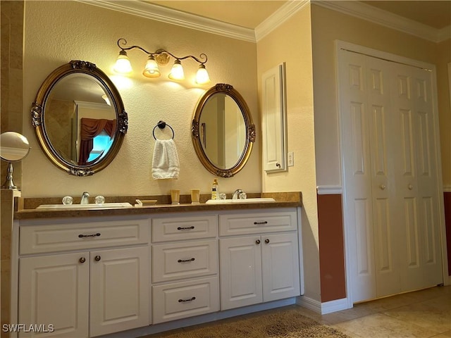 bathroom featuring vanity, crown molding, and tile patterned flooring