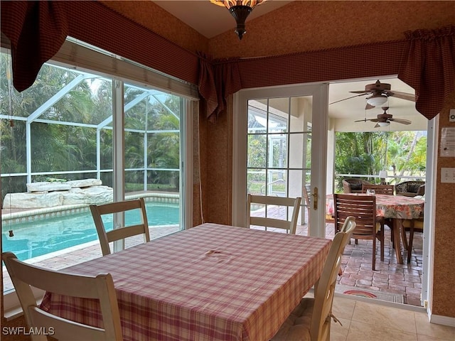 sunroom / solarium with ceiling fan