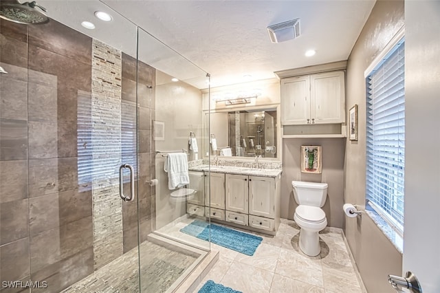 3131 Twin Lakes Ln, Sanibel, FL 33957 - full bath featuring visible vents, toilet, a stall shower, and a healthy amount of sunlight