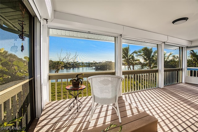 sunroom with a water view