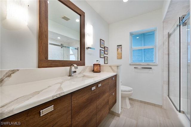 3131 Twin Lakes Ln, Sanibel, FL 33957 - full bathroom featuring vanity, visible vents, toilet, baseboards, and plenty of natural light