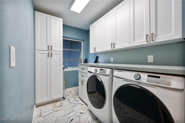 3131 Twin Lakes Ln, Sanibel, FL 33957 - clothes washing area featuring cabinet space, light tile patterned floors, and separate washer and dryer