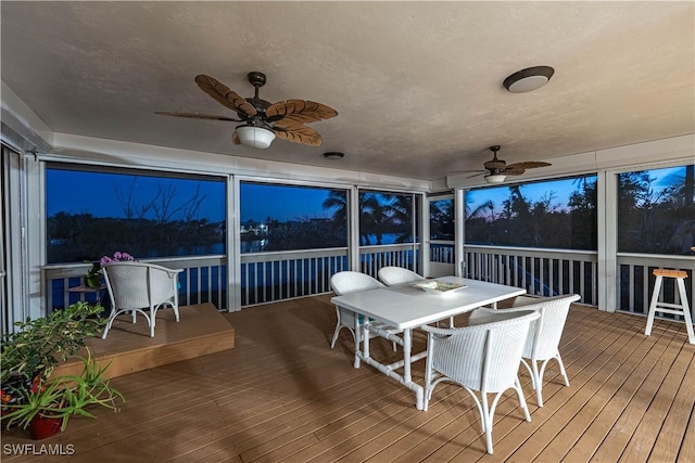 3131 Twin Lakes Ln, Sanibel, FL 33957 - sunroom / solarium with outdoor dining space and a ceiling fan