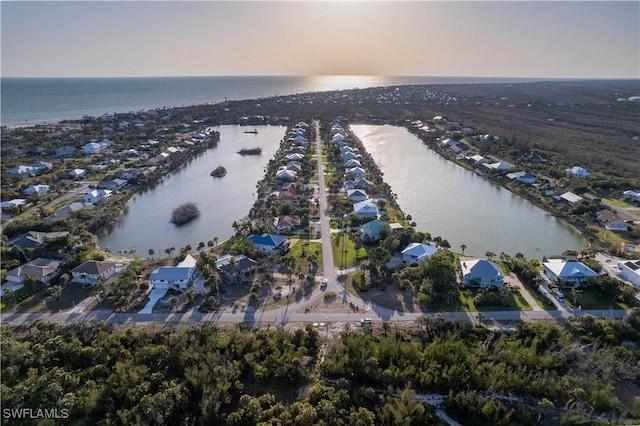 3131 Twin Lakes Ln, Sanibel, FL 33957 - birds eye view of property featuring a residential view and a water view