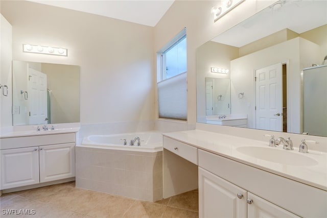 bathroom with vanity, plus walk in shower, and tile patterned flooring