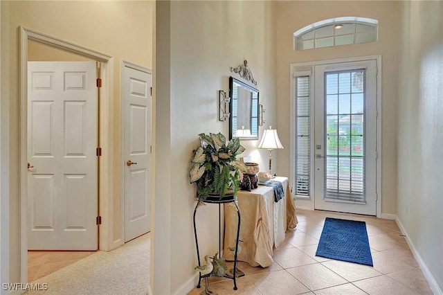 entryway featuring light tile patterned flooring