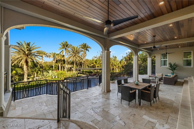 330 Cowry Ct, Sanibel, FL 33957 - view of patio / terrace featuring an outdoor hangout area, a water view, outdoor dining area, and ceiling fan