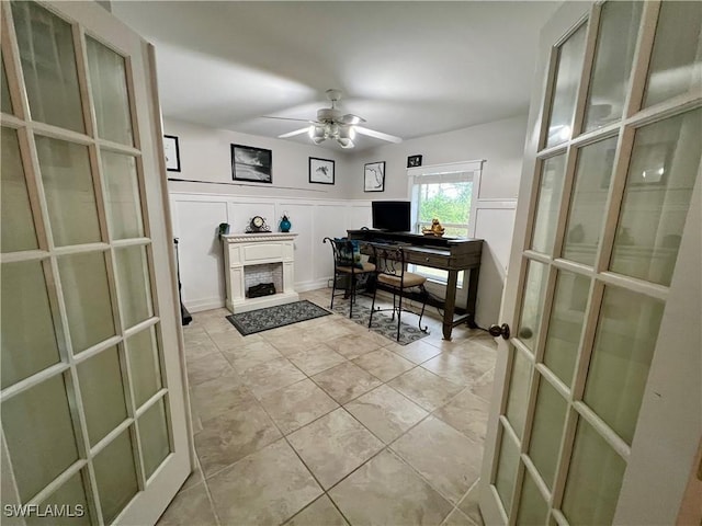 office area with ceiling fan