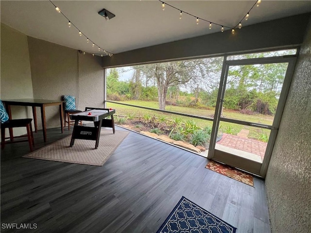 sunroom / solarium featuring a wealth of natural light