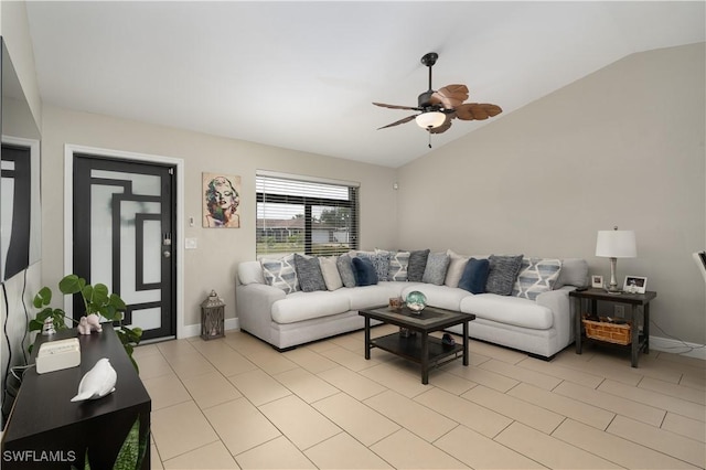 living room with ceiling fan and vaulted ceiling