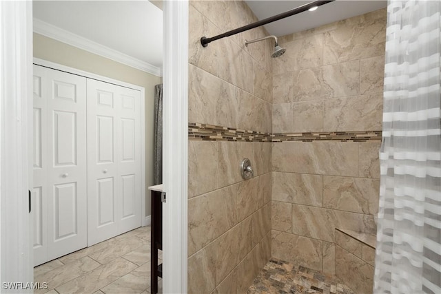 bathroom featuring a shower with shower curtain and ornamental molding