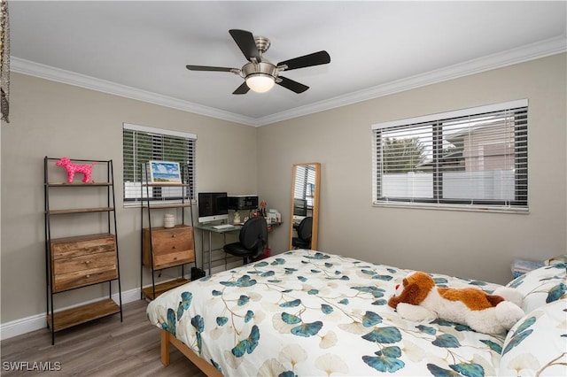 bedroom with ceiling fan, ornamental molding, and hardwood / wood-style flooring