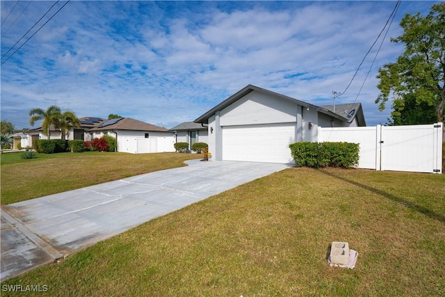 ranch-style home with a garage and a front yard