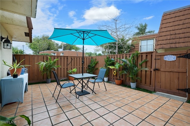 view of patio / terrace with fence and outdoor dining space