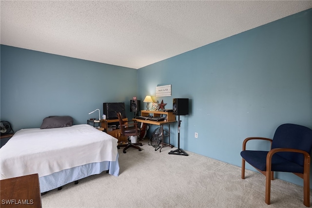 carpeted bedroom featuring a textured ceiling