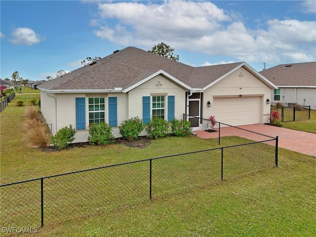 ranch-style house featuring a garage and a front lawn