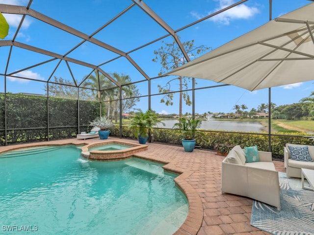 view of swimming pool with a patio area, a water view, a lanai, outdoor lounge area, and an in ground hot tub