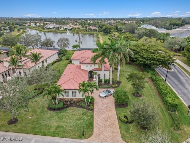 drone / aerial view with a water view