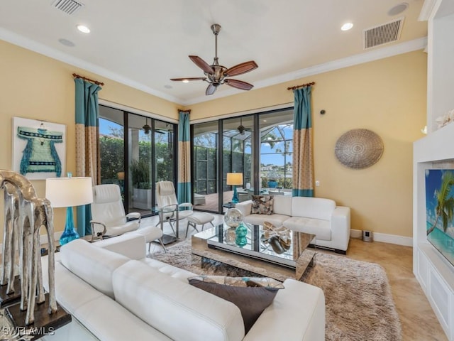 living room featuring crown molding and ceiling fan