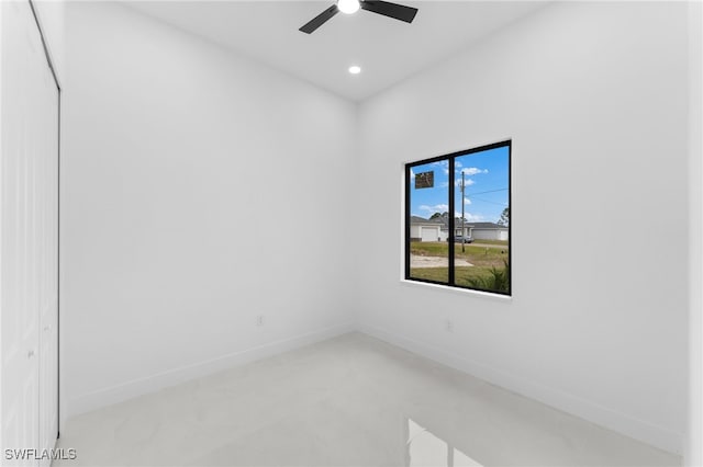 spare room with ceiling fan