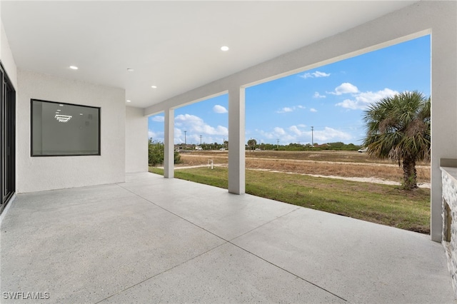 view of patio / terrace featuring a rural view