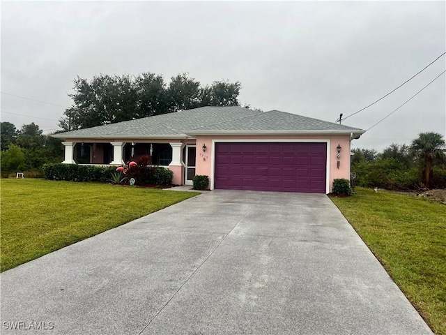 view of front facade featuring a garage and a front yard