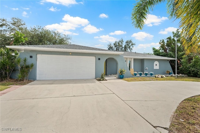 single story home featuring a garage