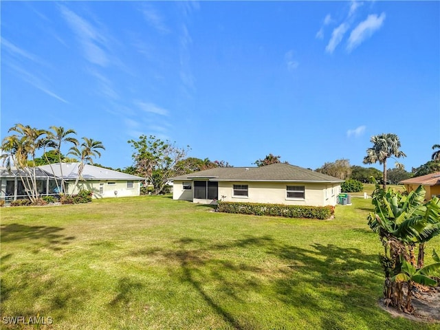 4348 Beechwood Lake Dr, Naples, FL 34112 - view of yard featuring a lanai