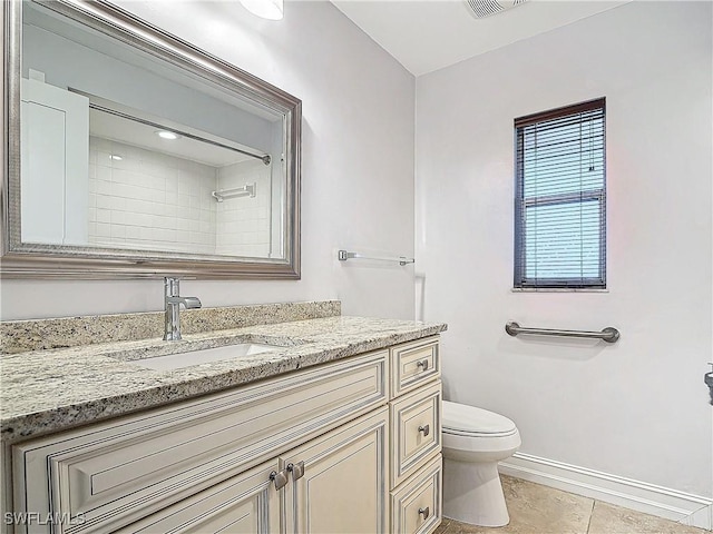 4348 Beechwood Lake Dr, Naples, FL 34112 - bathroom featuring tile patterned flooring, vanity, and toilet