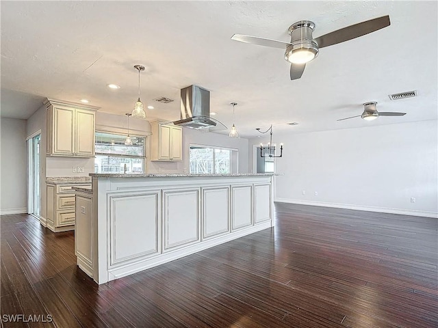 4348 Beechwood Lake Dr, Naples, FL 34112 - kitchen with pendant lighting, island range hood, and cream cabinetry