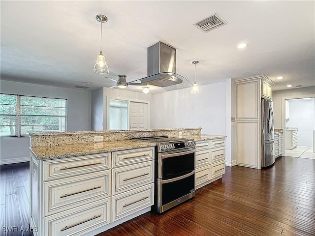 4348 Beechwood Lake Dr, Naples, FL 34112 - kitchen with appliances with stainless steel finishes, dark hardwood / wood-style floors, light stone counters, island exhaust hood, and decorative light fixtures