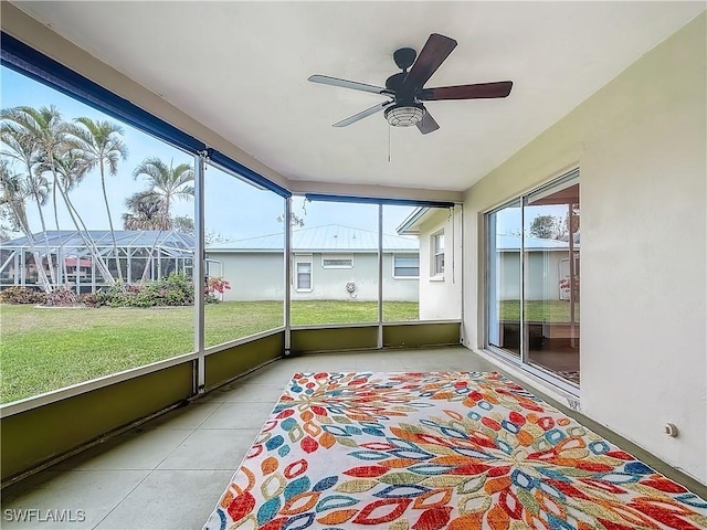4348 Beechwood Lake Dr, Naples, FL 34112 - unfurnished sunroom with ceiling fan